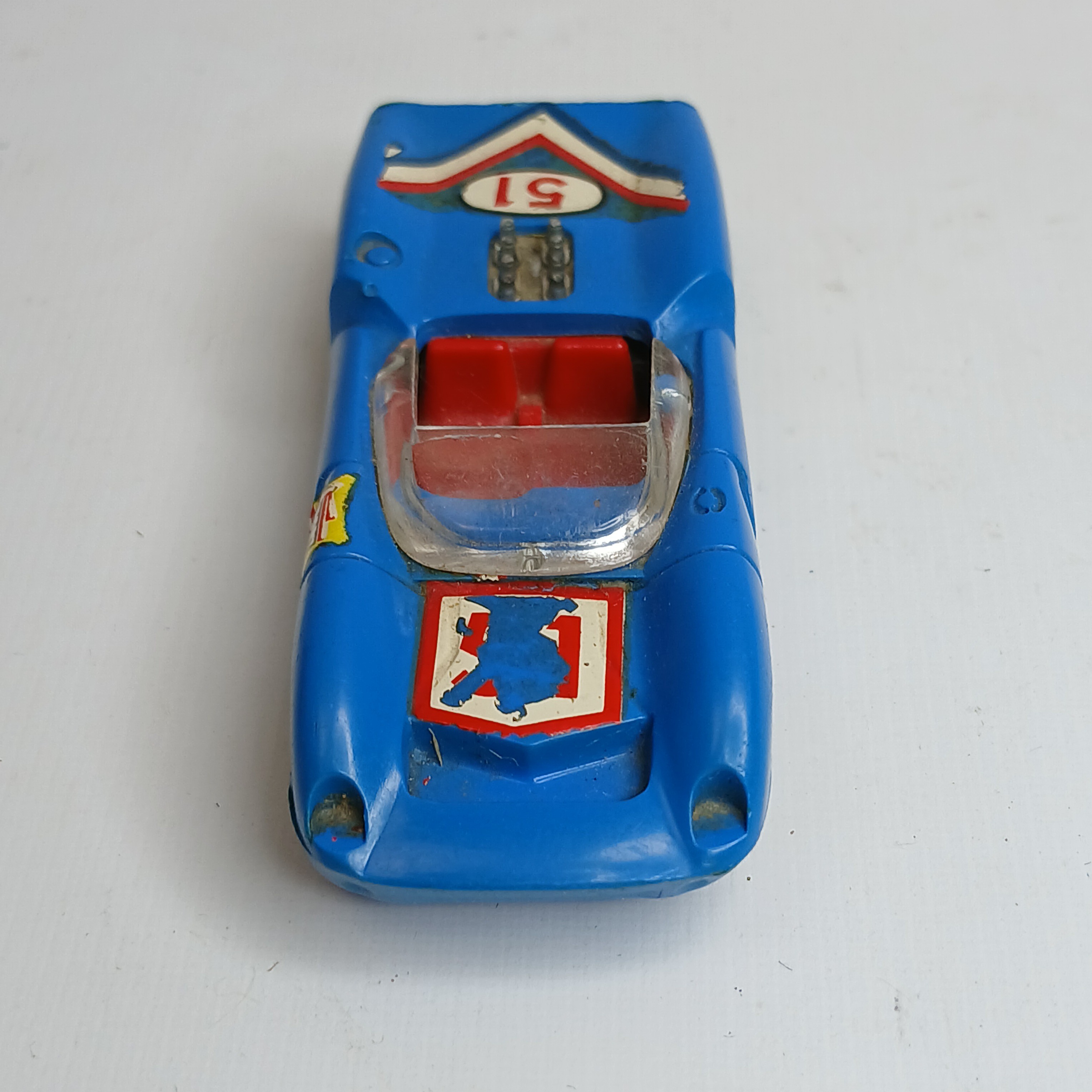 Voir photo 3 de Miniature CHAMPION - Lola T-70 (années 1960/70).Made in France - Echelle 1/64ème. Miniature CHAMPION - Lola T-70 (années 1960/70).Made in France - Echelle 1/64ème. État correct - Vue 3 -